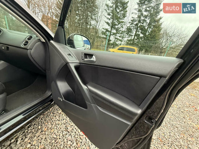 Чорний Фольксваген Тігуан, об'ємом двигуна 2 л та пробігом 238 тис. км за 10599 $, фото 28 на Automoto.ua