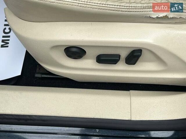 Чорний Фольксваген Тігуан, об'ємом двигуна 1.97 л та пробігом 336 тис. км за 14100 $, фото 6 на Automoto.ua