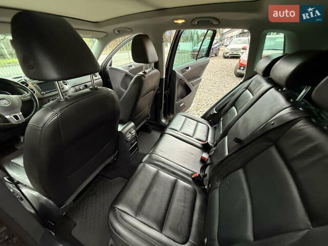 Чорний Фольксваген Тігуан, об'ємом двигуна 2 л та пробігом 238 тис. км за 10599 $, фото 39 на Automoto.ua