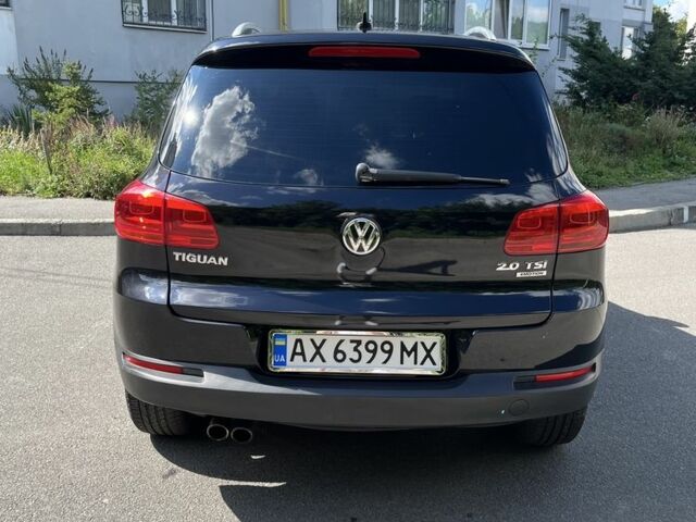 Черный Фольксваген Тигуан, объемом двигателя 2 л и пробегом 176 тыс. км за 12499 $, фото 2 на Automoto.ua