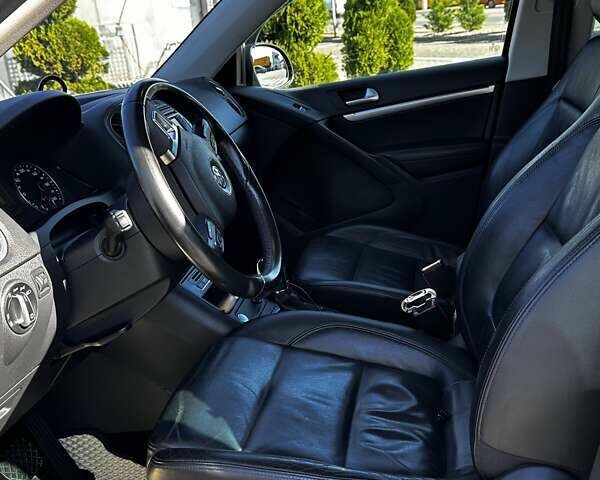 Черный Фольксваген Тигуан, объемом двигателя 1.97 л и пробегом 215 тыс. км за 15000 $, фото 12 на Automoto.ua