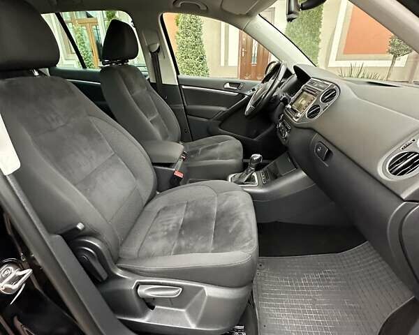 Черный Фольксваген Тигуан, объемом двигателя 1.99 л и пробегом 225 тыс. км за 14950 $, фото 52 на Automoto.ua