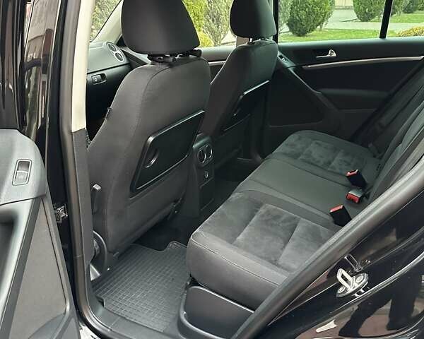 Черный Фольксваген Тигуан, объемом двигателя 1.99 л и пробегом 225 тыс. км за 14950 $, фото 70 на Automoto.ua