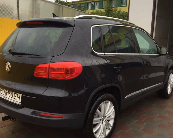 Черный Фольксваген Тигуан, объемом двигателя 2 л и пробегом 130 тыс. км за 13300 $, фото 3 на Automoto.ua