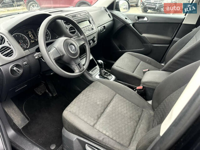 Чорний Фольксваген Тігуан, об'ємом двигуна 2 л та пробігом 165 тис. км за 9499 $, фото 7 на Automoto.ua