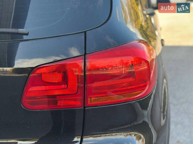 Чорний Фольксваген Тігуан, об'ємом двигуна 2 л та пробігом 189 тис. км за 10300 $, фото 32 на Automoto.ua