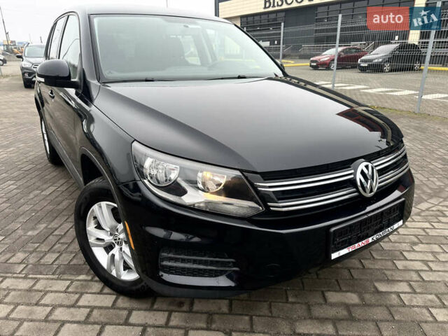 Чорний Фольксваген Тігуан, об'ємом двигуна 2 л та пробігом 165 тис. км за 9499 $, фото 4 на Automoto.ua