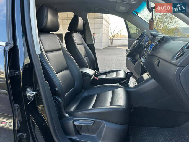 Чорний Фольксваген Тігуан, об'ємом двигуна 2 л та пробігом 189 тис. км за 10300 $, фото 22 на Automoto.ua