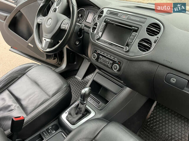 Черный Фольксваген Тигуан, объемом двигателя 1.99 л и пробегом 320 тыс. км за 14499 $, фото 151 на Automoto.ua