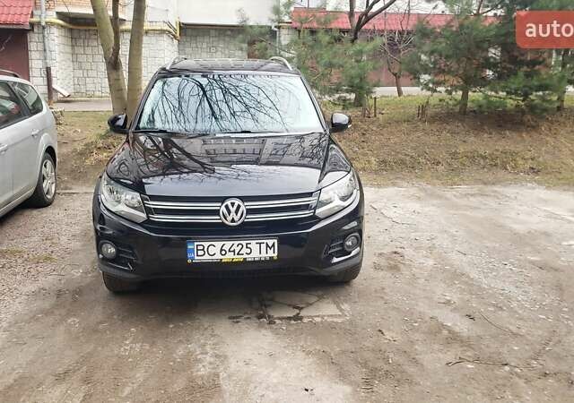 Черный Фольксваген Тигуан, объемом двигателя 2 л и пробегом 267 тыс. км за 13000 $, фото 1 на Automoto.ua