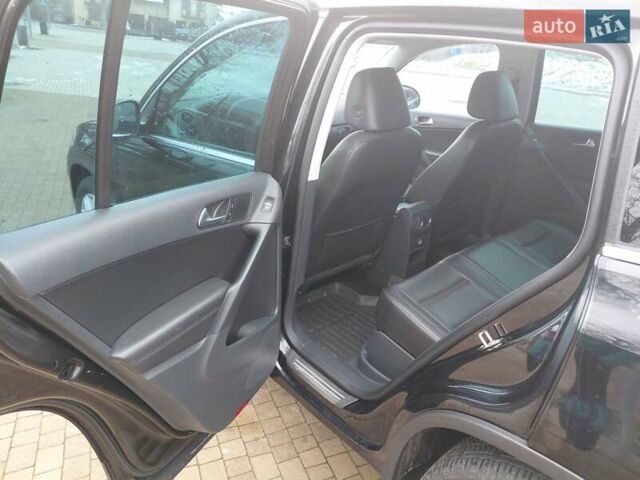 Чорний Фольксваген Тігуан, об'ємом двигуна 2 л та пробігом 227 тис. км за 8999 $, фото 12 на Automoto.ua