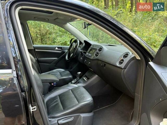 Черный Фольксваген Тигуан, объемом двигателя 1.97 л и пробегом 270 тыс. км за 11500 $, фото 2 на Automoto.ua