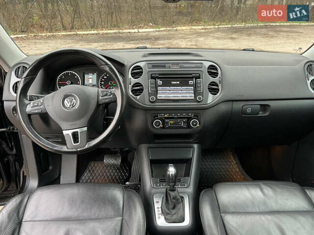 Черный Фольксваген Тигуан, объемом двигателя 1.99 л и пробегом 320 тыс. км за 14499 $, фото 107 на Automoto.ua