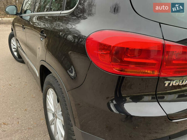 Черный Фольксваген Тигуан, объемом двигателя 1.99 л и пробегом 320 тыс. км за 14499 $, фото 63 на Automoto.ua