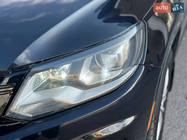 Чорний Фольксваген Тігуан, об'ємом двигуна 2 л та пробігом 189 тис. км за 10300 $, фото 30 на Automoto.ua