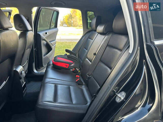Чорний Фольксваген Тігуан, об'ємом двигуна 2 л та пробігом 189 тис. км за 10300 $, фото 27 на Automoto.ua