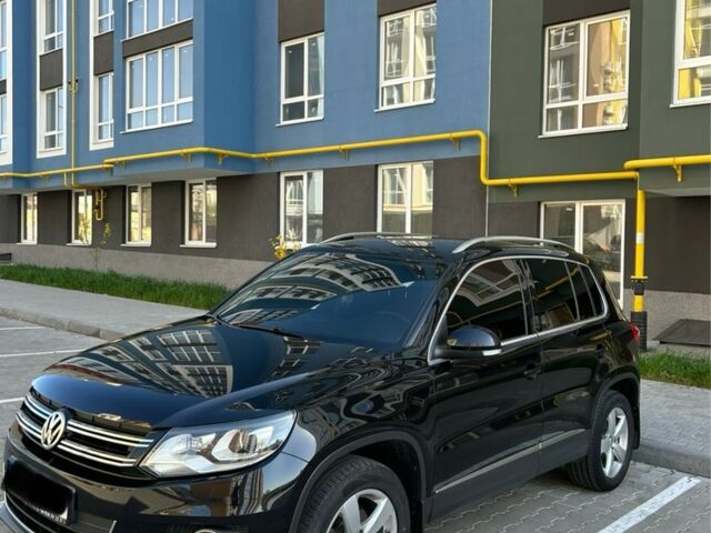 Чорний Фольксваген Тігуан, об'ємом двигуна 0 л та пробігом 195 тис. км за 16000 $, фото 1 на Automoto.ua