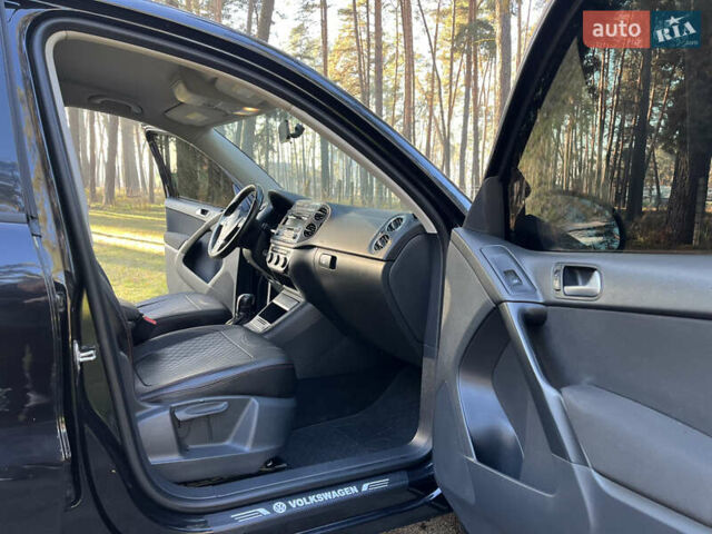 Черный Фольксваген Тигуан, объемом двигателя 2 л и пробегом 185 тыс. км за 11500 $, фото 26 на Automoto.ua