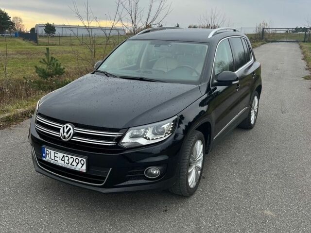 Чорний Фольксваген Тігуан, об'ємом двигуна 2 л та пробігом 160 тис. км за 7800 $, фото 1 на Automoto.ua