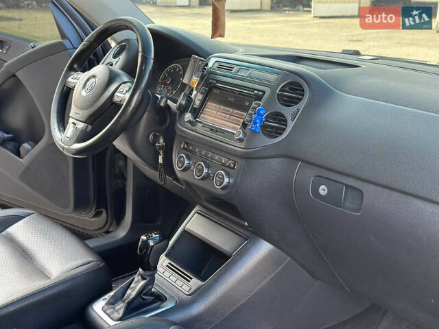 Чорний Фольксваген Тігуан, об'ємом двигуна 2 л та пробігом 189 тис. км за 10300 $, фото 24 на Automoto.ua