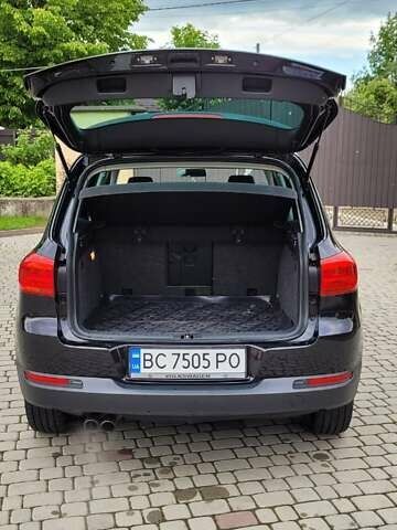 Черный Фольксваген Тигуан, объемом двигателя 1.98 л и пробегом 186 тыс. км за 12500 $, фото 1 на Automoto.ua