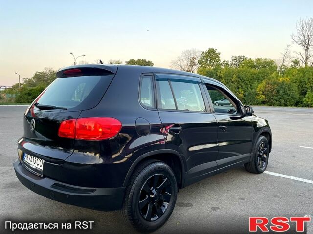 Черный Фольксваген Тигуан, объемом двигателя 2 л и пробегом 181 тыс. км за 9200 $, фото 3 на Automoto.ua