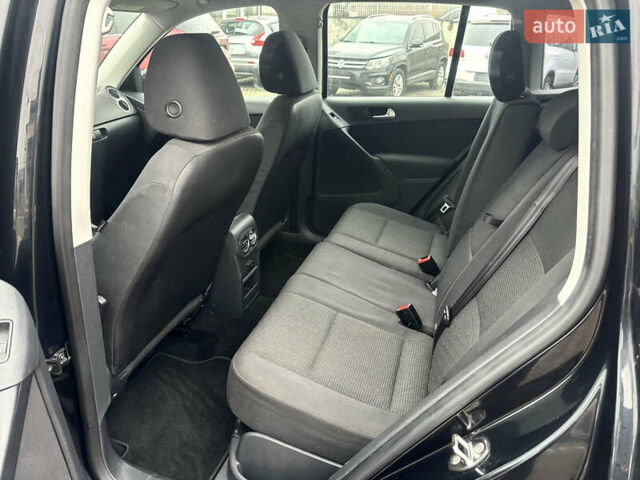 Чорний Фольксваген Тігуан, об'ємом двигуна 2 л та пробігом 165 тис. км за 9499 $, фото 10 на Automoto.ua