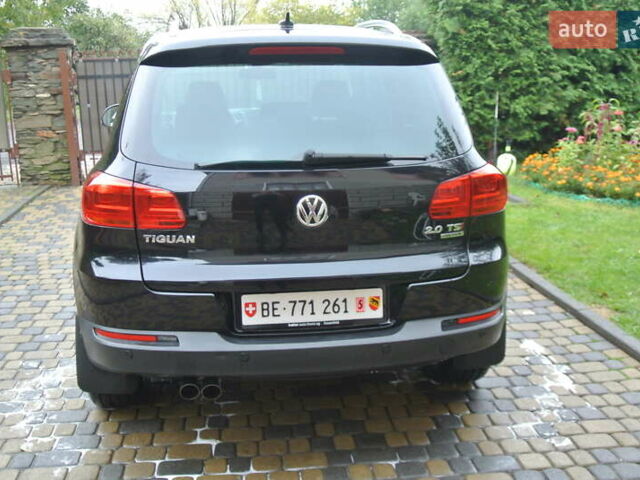 Чорний Фольксваген Тігуан, об'ємом двигуна 2 л та пробігом 168 тис. км за 15550 $, фото 4 на Automoto.ua
