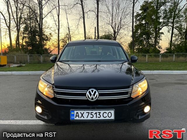 Черный Фольксваген Тигуан, объемом двигателя 2 л и пробегом 181 тыс. км за 9200 $, фото 1 на Automoto.ua