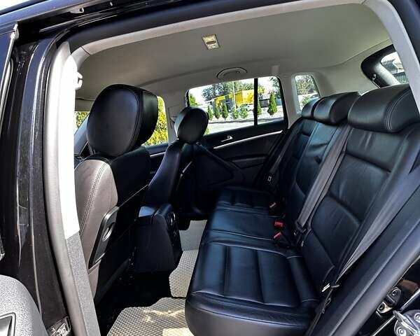 Черный Фольксваген Тигуан, объемом двигателя 1.97 л и пробегом 215 тыс. км за 15000 $, фото 8 на Automoto.ua