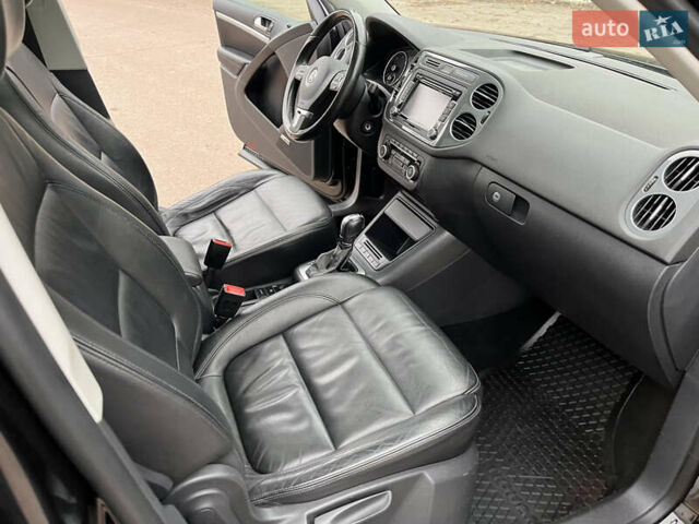 Черный Фольксваген Тигуан, объемом двигателя 1.99 л и пробегом 320 тыс. км за 14499 $, фото 147 на Automoto.ua