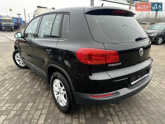 Чорний Фольксваген Тігуан, об'ємом двигуна 2 л та пробігом 165 тис. км за 9499 $, фото 6 на Automoto.ua