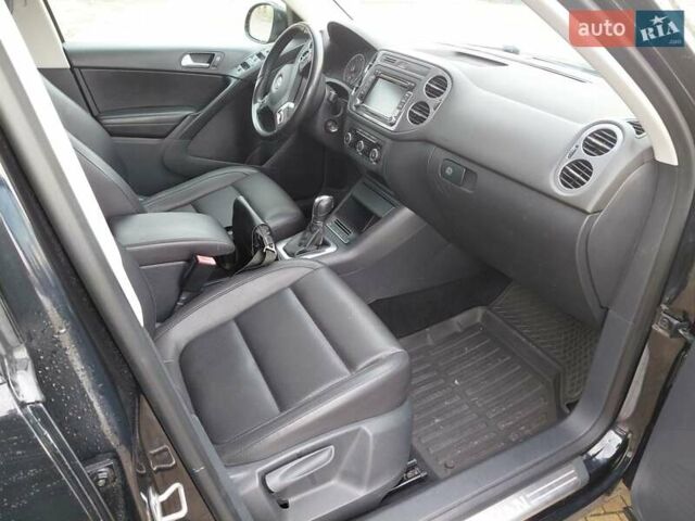 Чорний Фольксваген Тігуан, об'ємом двигуна 2 л та пробігом 227 тис. км за 8999 $, фото 11 на Automoto.ua