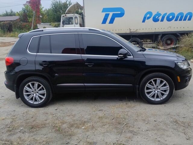 Чорний Фольксваген Тігуан, об'ємом двигуна 2 л та пробігом 189 тис. км за 11100 $, фото 4 на Automoto.ua