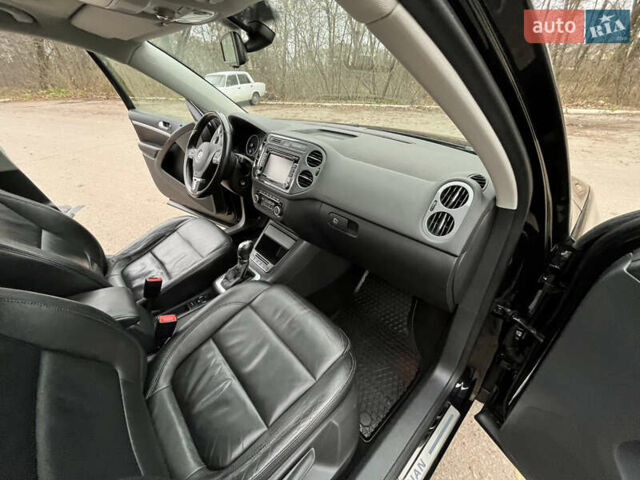 Черный Фольксваген Тигуан, объемом двигателя 1.99 л и пробегом 320 тыс. км за 14499 $, фото 153 на Automoto.ua