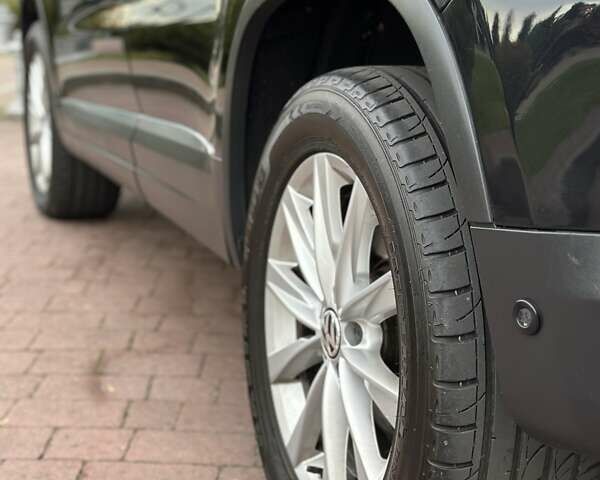 Черный Фольксваген Тигуан, объемом двигателя 1.99 л и пробегом 225 тыс. км за 14950 $, фото 42 на Automoto.ua