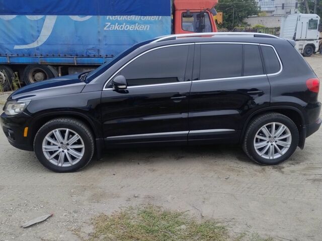 Чорний Фольксваген Тігуан, об'ємом двигуна 2 л та пробігом 189 тис. км за 11100 $, фото 1 на Automoto.ua