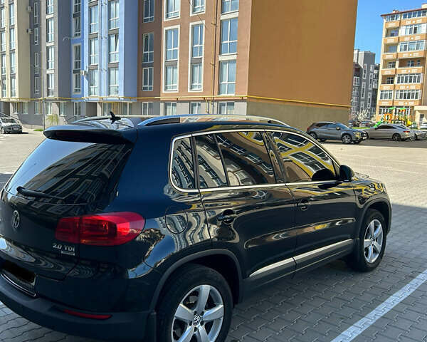 Чорний Фольксваген Тігуан, об'ємом двигуна 1.97 л та пробігом 185 тис. км за 15400 $, фото 2 на Automoto.ua