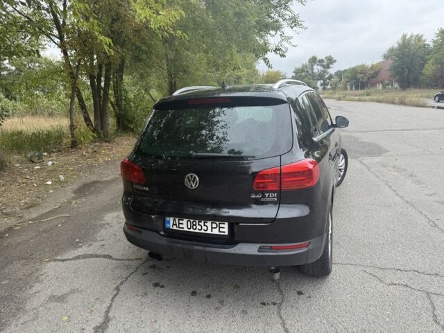 Черный Фольксваген Тигуан, объемом двигателя 2 л и пробегом 181 тыс. км за 13999 $, фото 1 на Automoto.ua