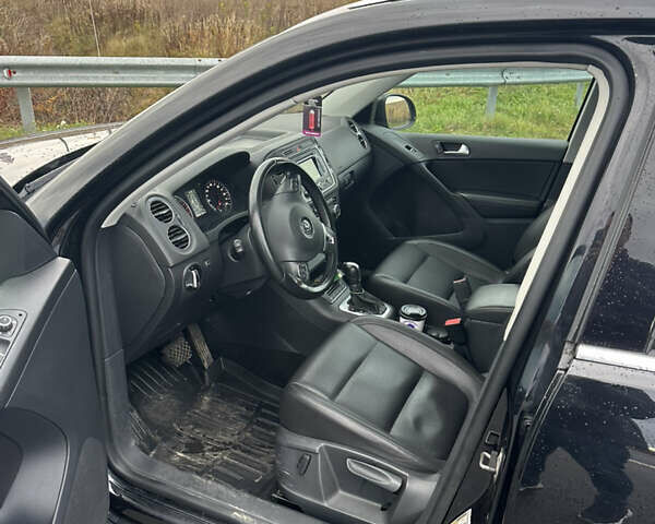 Чорний Фольксваген Тігуан, об'ємом двигуна 1.98 л та пробігом 207 тис. км за 11800 $, фото 6 на Automoto.ua