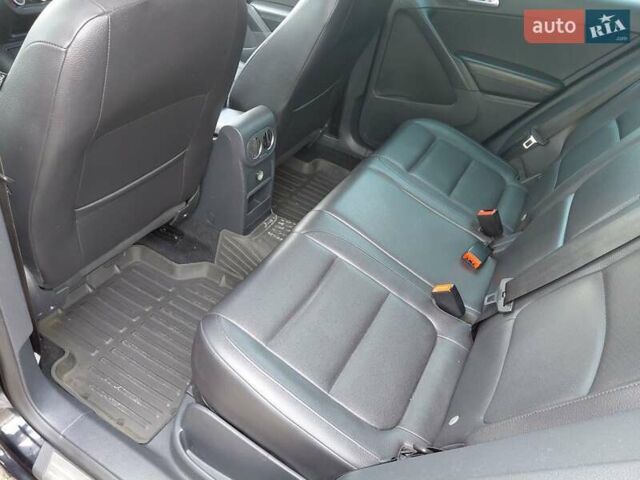 Чорний Фольксваген Тігуан, об'ємом двигуна 2 л та пробігом 227 тис. км за 8999 $, фото 10 на Automoto.ua