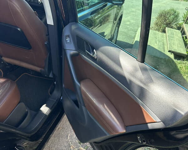 Чорний Фольксваген Тігуан, об'ємом двигуна 1.97 л та пробігом 231 тис. км за 15000 $, фото 6 на Automoto.ua