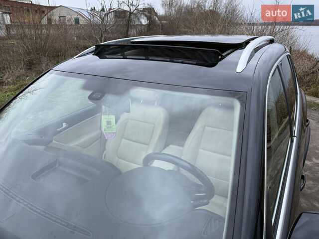 Чорний Фольксваген Тігуан, об'ємом двигуна 2 л та пробігом 234 тис. км за 15500 $, фото 25 на Automoto.ua