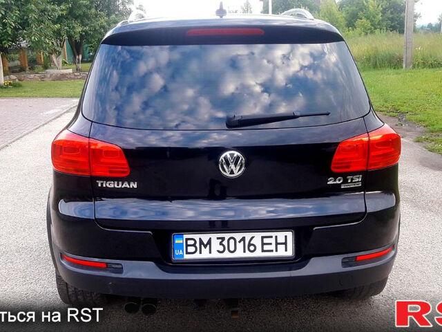 Чорний Фольксваген Тігуан, об'ємом двигуна 2 л та пробігом 183 тис. км за 12500 $, фото 4 на Automoto.ua