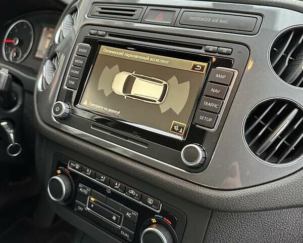 Черный Фольксваген Тигуан, объемом двигателя 1.99 л и пробегом 225 тыс. км за 14950 $, фото 48 на Automoto.ua