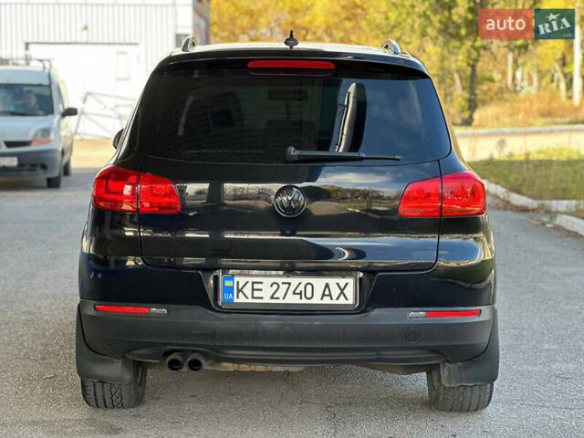 Чорний Фольксваген Тігуан, об'ємом двигуна 2 л та пробігом 189 тис. км за 10300 $, фото 4 на Automoto.ua