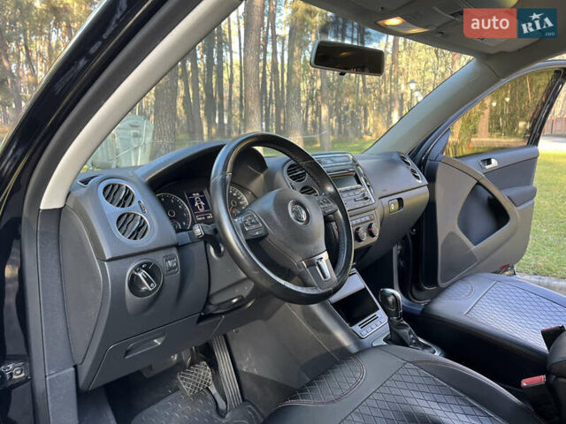 Черный Фольксваген Тигуан, объемом двигателя 2 л и пробегом 185 тыс. км за 11500 $, фото 24 на Automoto.ua