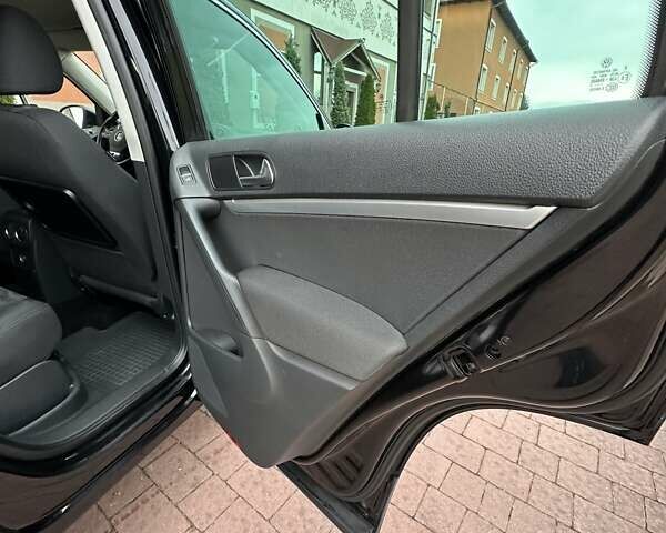 Черный Фольксваген Тигуан, объемом двигателя 1.99 л и пробегом 225 тыс. км за 14950 $, фото 76 на Automoto.ua