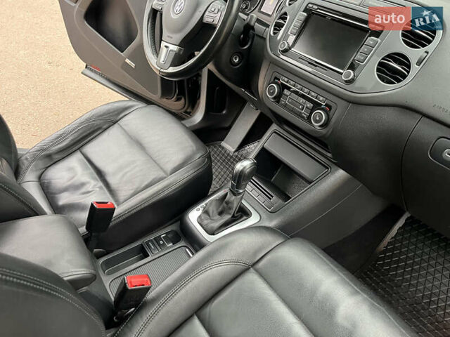 Черный Фольксваген Тигуан, объемом двигателя 1.99 л и пробегом 320 тыс. км за 14499 $, фото 152 на Automoto.ua