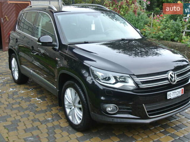 Чорний Фольксваген Тігуан, об'ємом двигуна 2 л та пробігом 168 тис. км за 15550 $, фото 1 на Automoto.ua